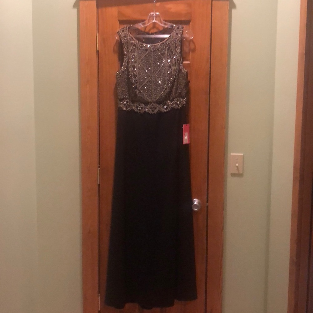 Elegant formal black beaded dress.